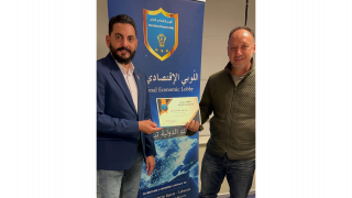 The businessman, Mr. Abbas Al Mousawi, receives the certificate of participation and appreciation from the President of the Lobby, Dr. Ali El-Masri for his participation in the Izmir Clothing Fair